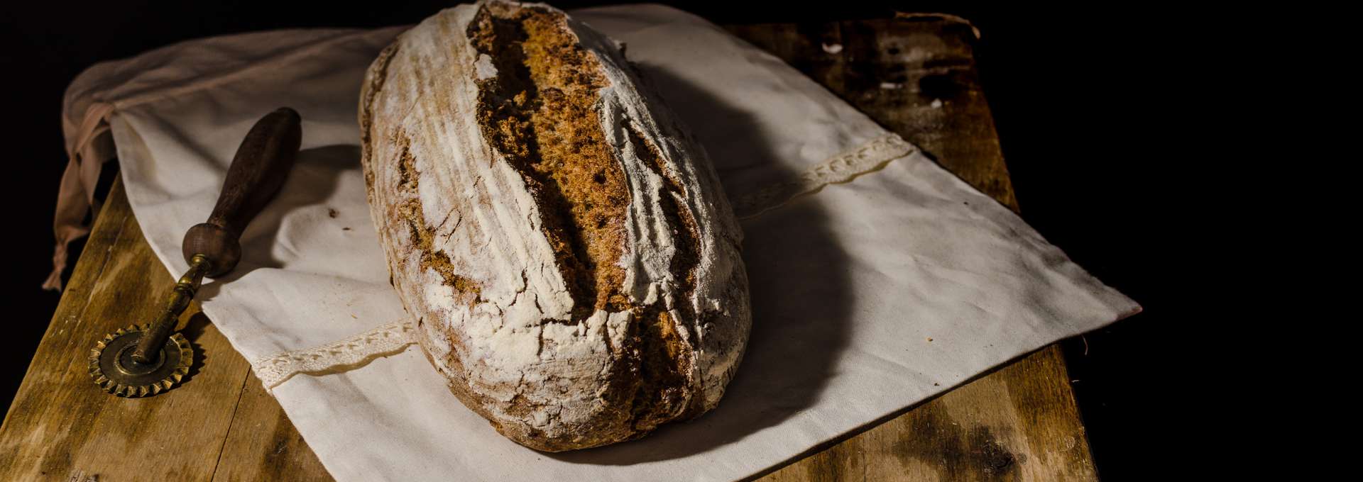 Homemade bread rustic sourdough, in chef hands